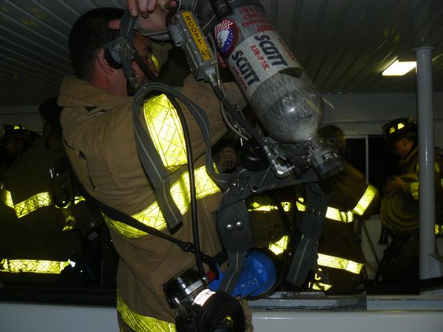 Firefighters traveling to Fire Island Pines for working fire via ferry.